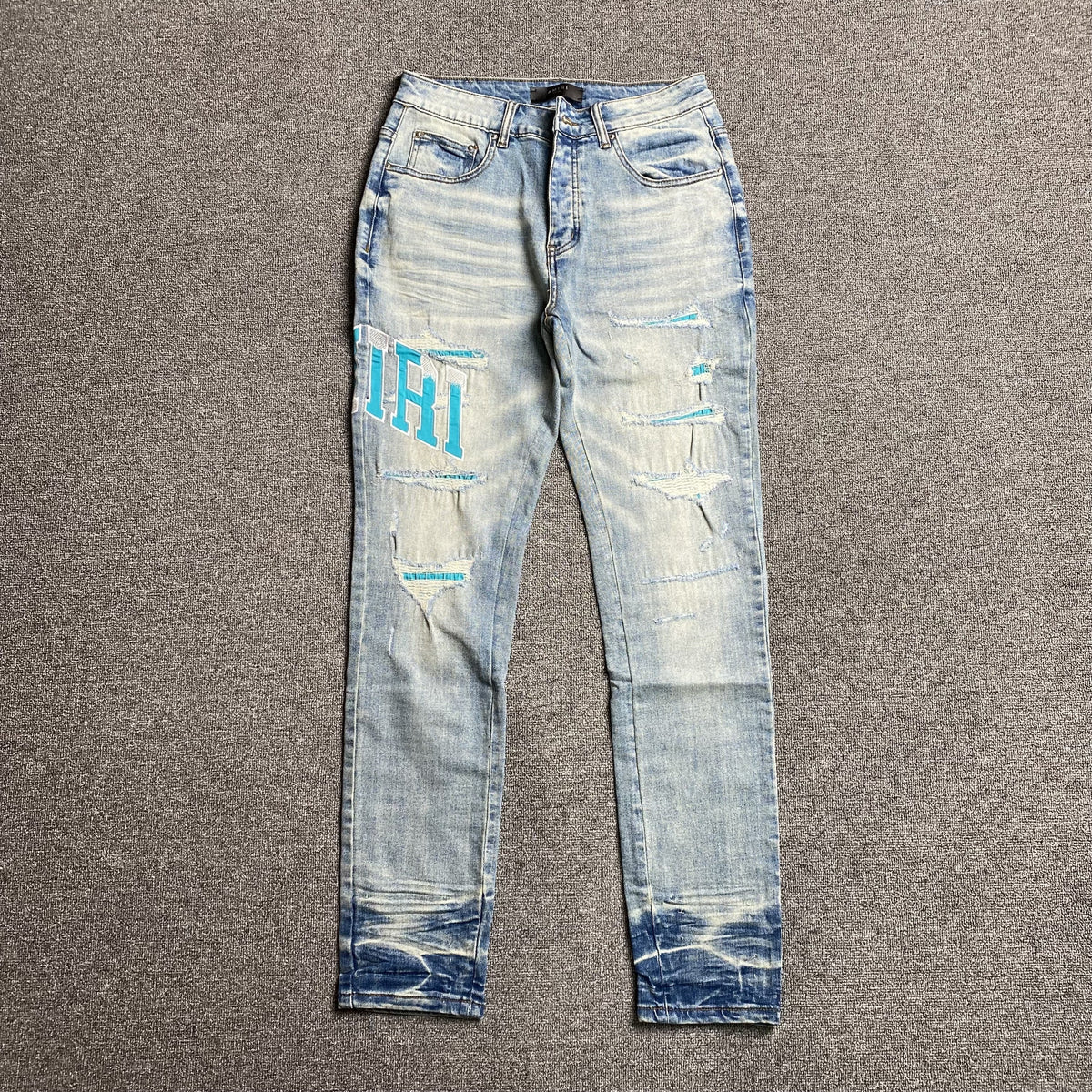 AMIRI VARSITY LOGO JEANS - netstar®
