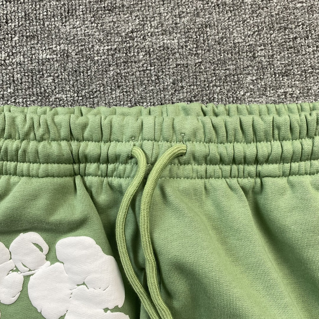 DENIM TEARS COTTON WREATH SWEATPANTS LIGHT GREEN - netstar
