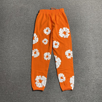 DENIM TEARS COTTON WREATH SWEATPANTS ORANGE - netstar