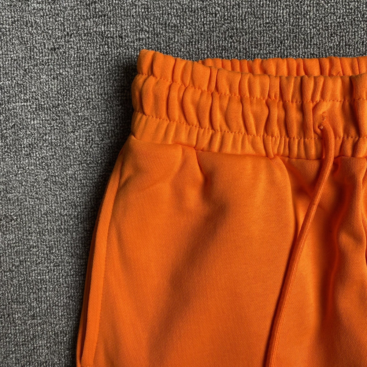 DENIM TEARS COTTON WREATH SWEATPANTS ORANGE - netstar