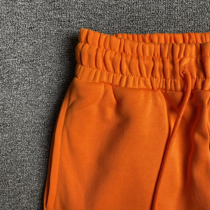 DENIM TEARS COTTON WREATH SWEATPANTS ORANGE - netstar