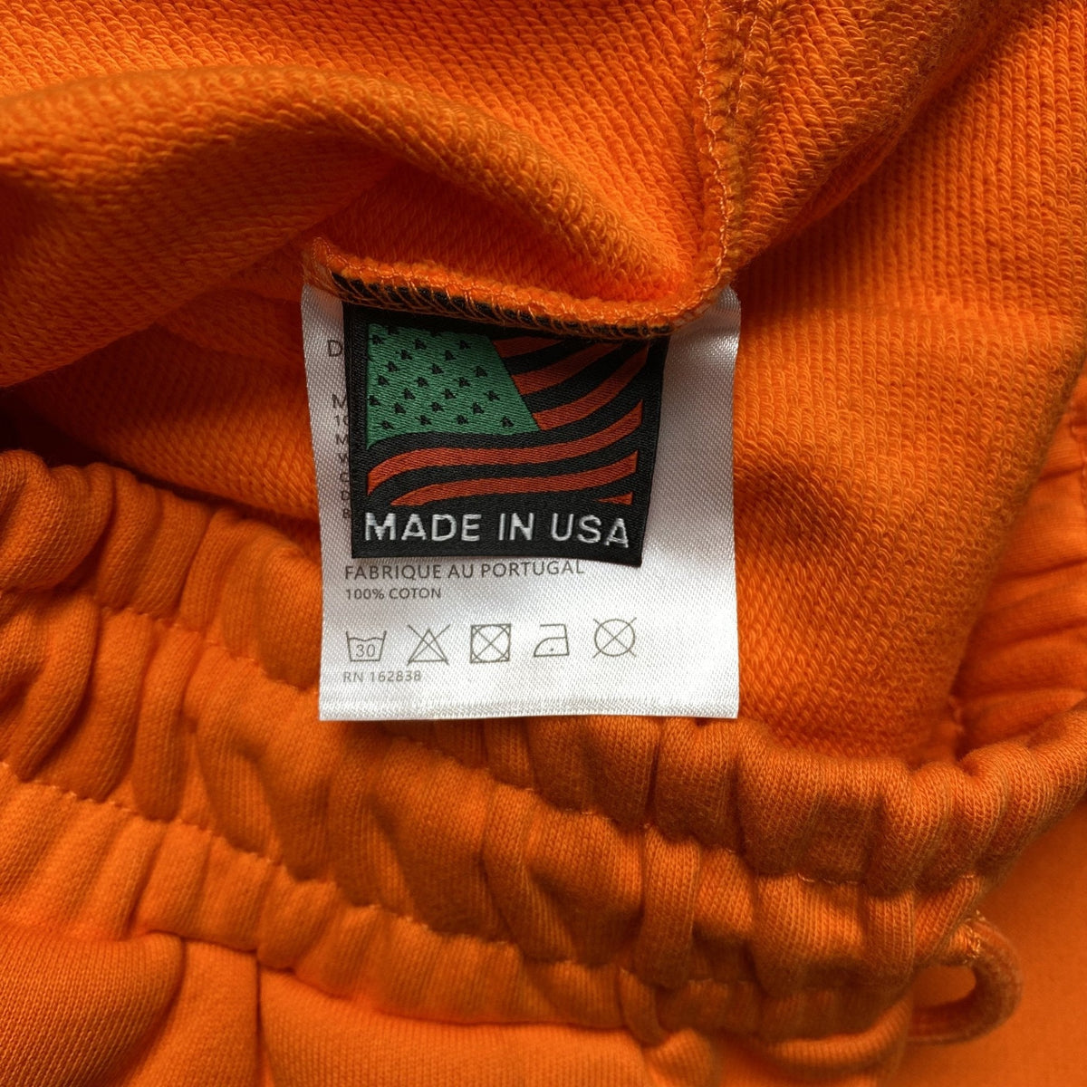 DENIM TEARS COTTON WREATH SWEATPANTS ORANGE - netstar