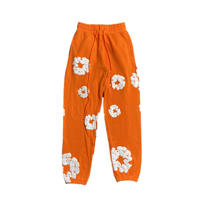 DENIM TEARS COTTON WREATH SWEATPANTS ORANGE - netstar