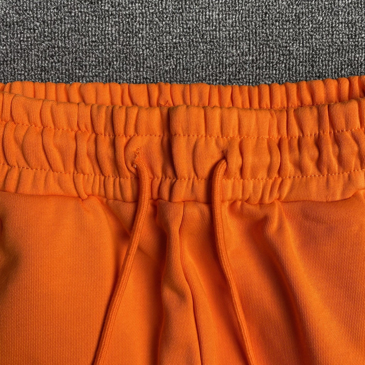 DENIM TEARS COTTON WREATH SWEATPANTS ORANGE - netstar
