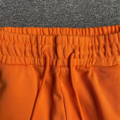 DENIM TEARS COTTON WREATH SWEATPANTS ORANGE - netstar