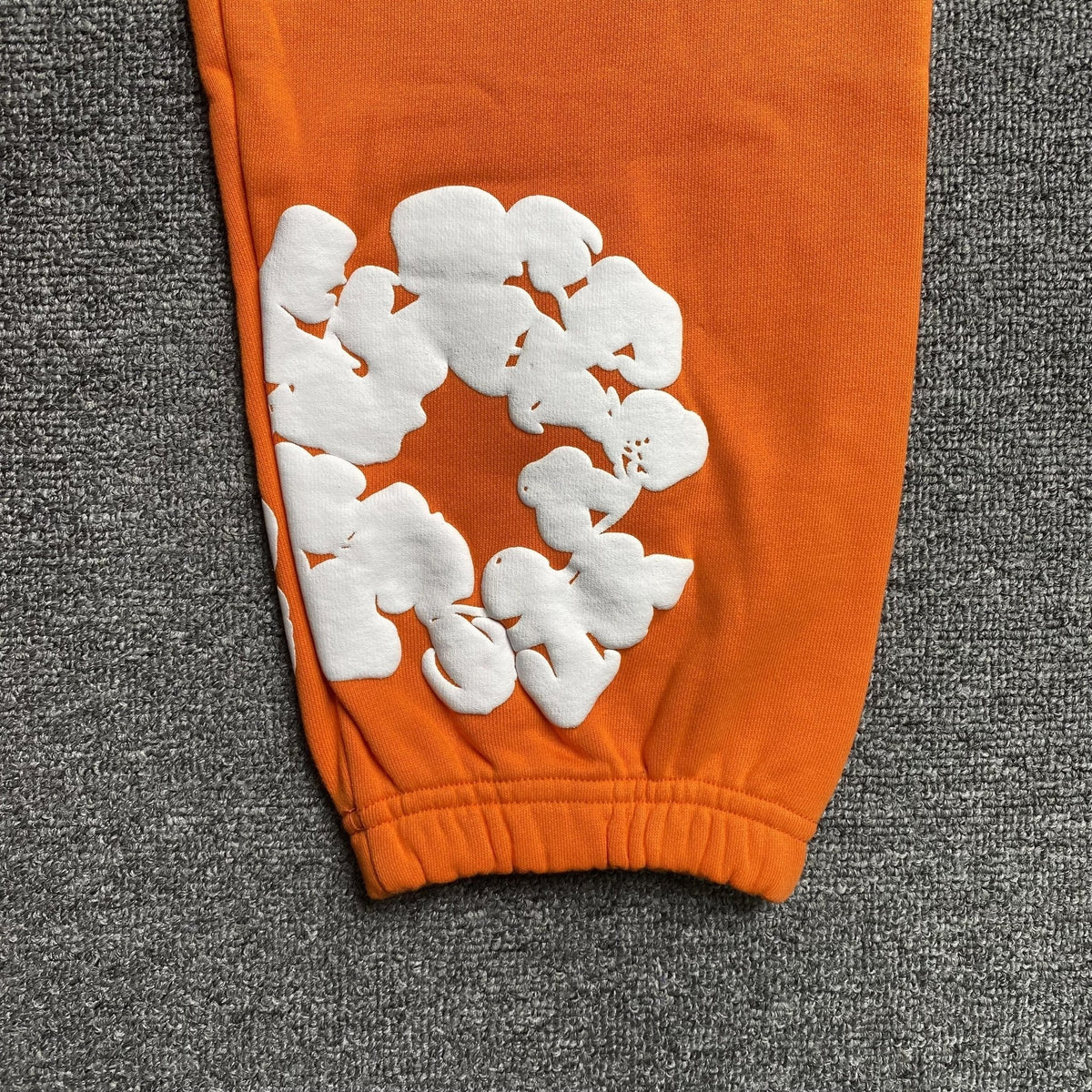 DENIM TEARS COTTON WREATH SWEATPANTS ORANGE - netstar