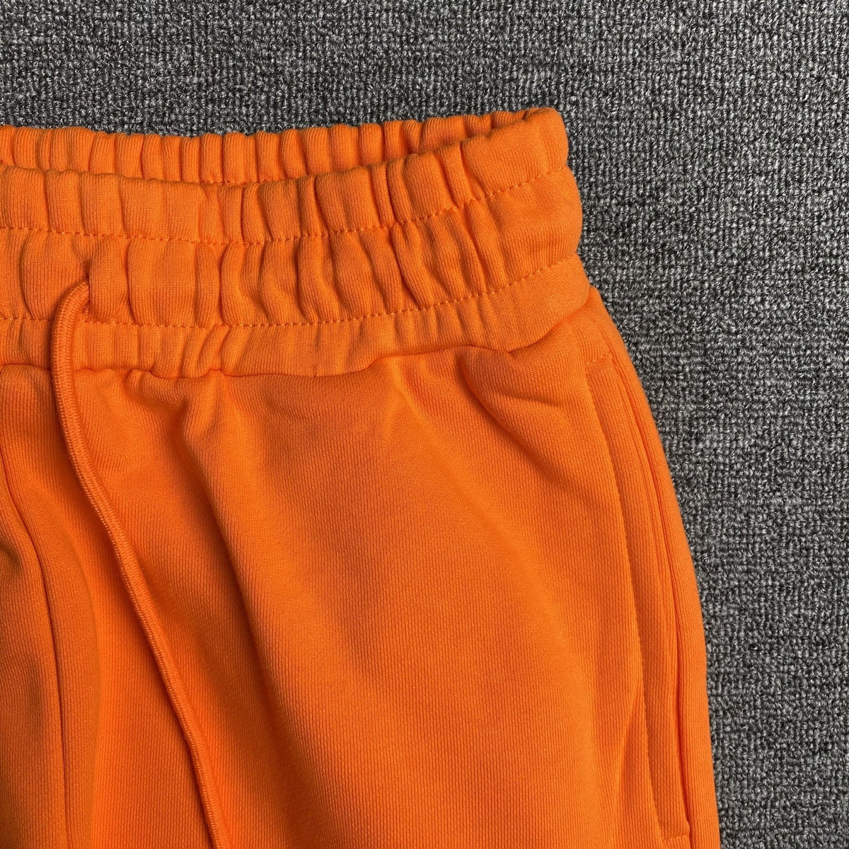 DENIM TEARS COTTON WREATH SWEATPANTS ORANGE - netstar