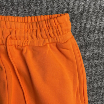 DENIM TEARS COTTON WREATH SWEATPANTS ORANGE - netstar